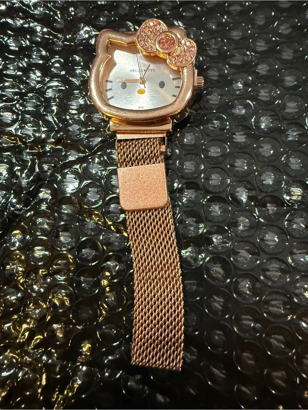 Hello Kitty Rose Gold Tone Mesh Watch with Crystal Bow Accent